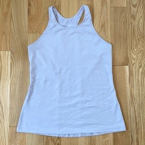 Under Armor workout tank top size large in lilac. High neck line.